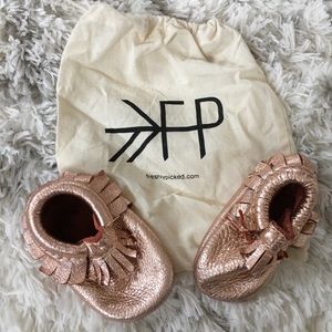 Freshly picked rose gold baby moccasins